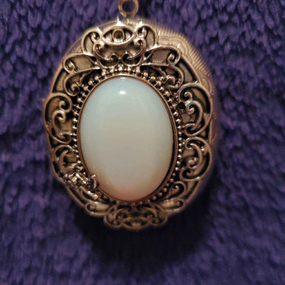 Faux silver/opal locket